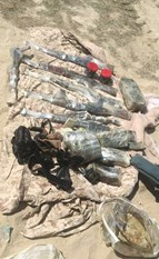 سرقة السلاح الشخصي لضابط في مطار الكويت والعثور على  6 رشاشات و1000 طلقة  ومسدس في أم الهيمان